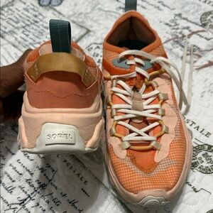Sorel Orange and Cream Sneakers